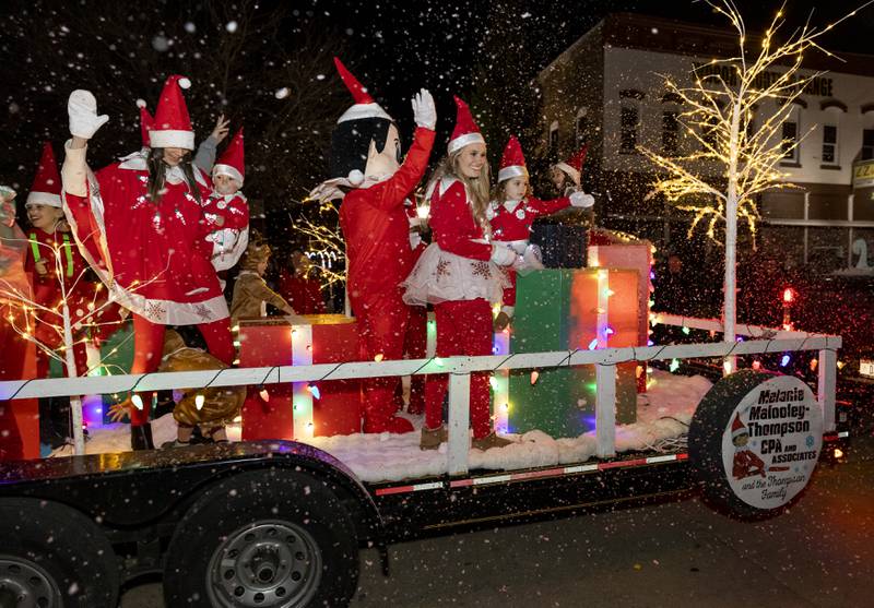 Spring Valley Mayor Melanie Malooley Thompson (and her business Melanie Malooley Thompson CPA) and family ride their Elf on a Shelf float complete with snow Saturday, Nov. 26, 2022, at the Spring Valley Lighted Christmas Parade.