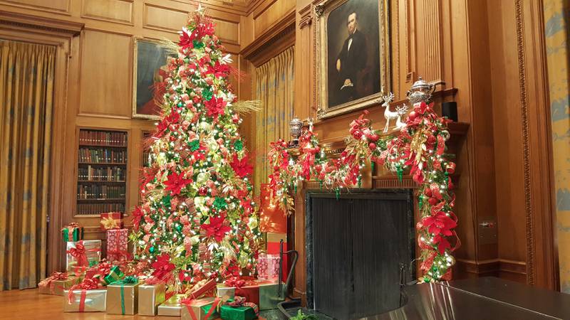 Lavish holiday decorations will greet guests inside McCormick House, including iconic Freedom Hall, the home’s cavernous library.