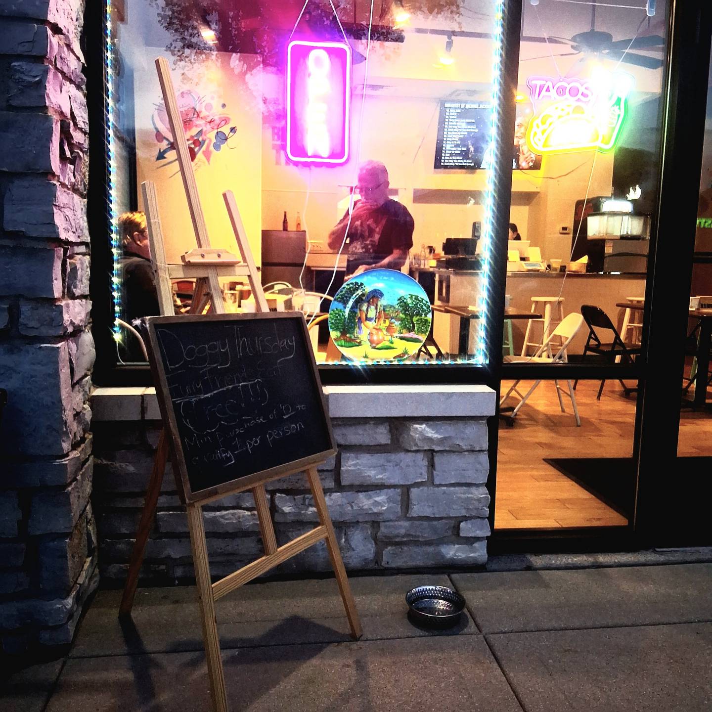 The sign outside proclaims Doggy Thursday at Barrio Taqueria & Cocina in Carol Stream where doggy dinners of grilled chicken or beef are free if a customer spends $12. The restaurant, which features traditional Mexican street fare, also offers a water dish outside for pets.