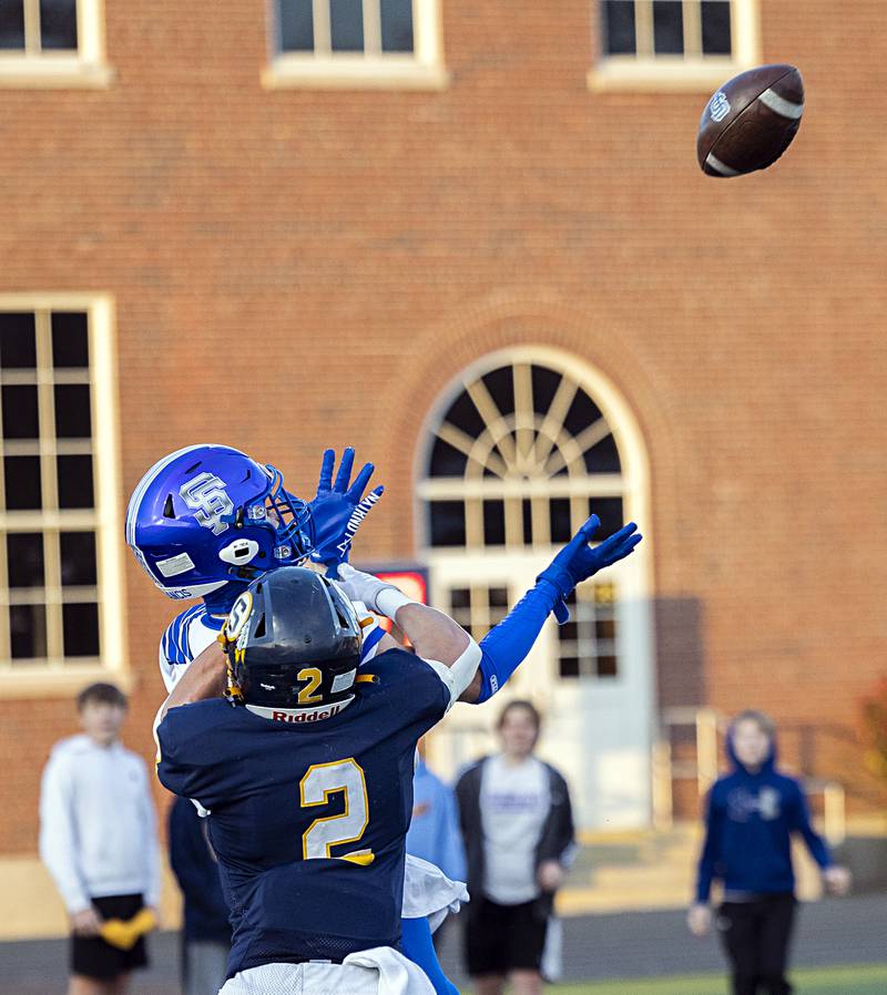 St. Francis’ Zachary Washington makes a catch for a TD against Sterling’s Cale Ledergerber Saturday, Nov. 4, 2023 in a class 5A playoff game in Sterling.