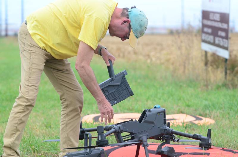 SHARK member Mike Kobliska prepares to fly a drone in Rochelle on Saturday, Oct. 18, 2025.
