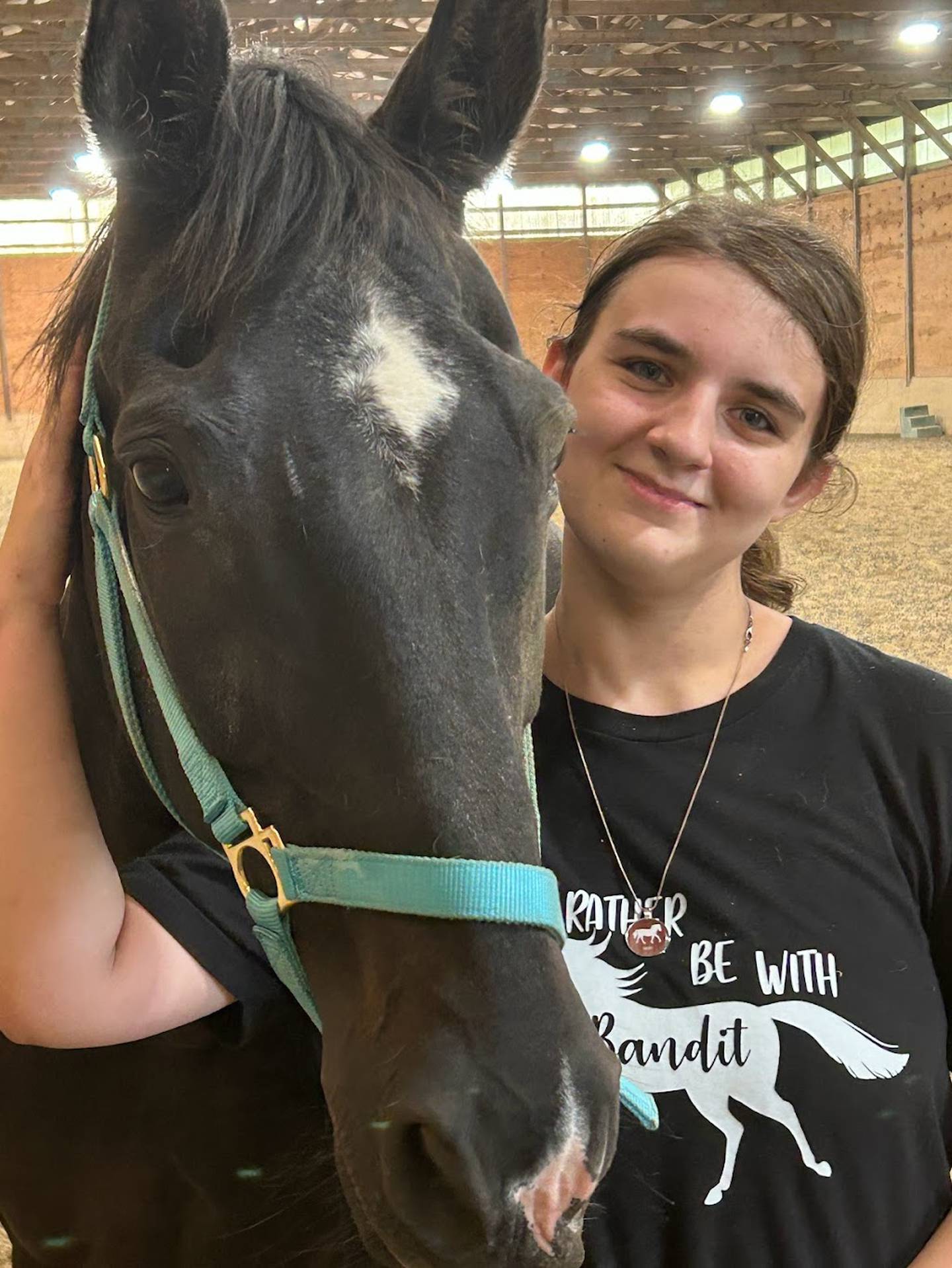 Emma Grzesik and her horse Bandit at Casey's Safe Haven in Maple Park.
