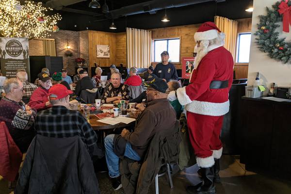 ‘It’s about the community’ -Veterans ring in the holidays at special breakfast in downtown Oswego 