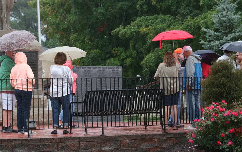Ladd residents attend a memorial service remembering lives lost on September 11, 2001 on Monday Sept. 11, 2023 at Veterans Park in Ladd.