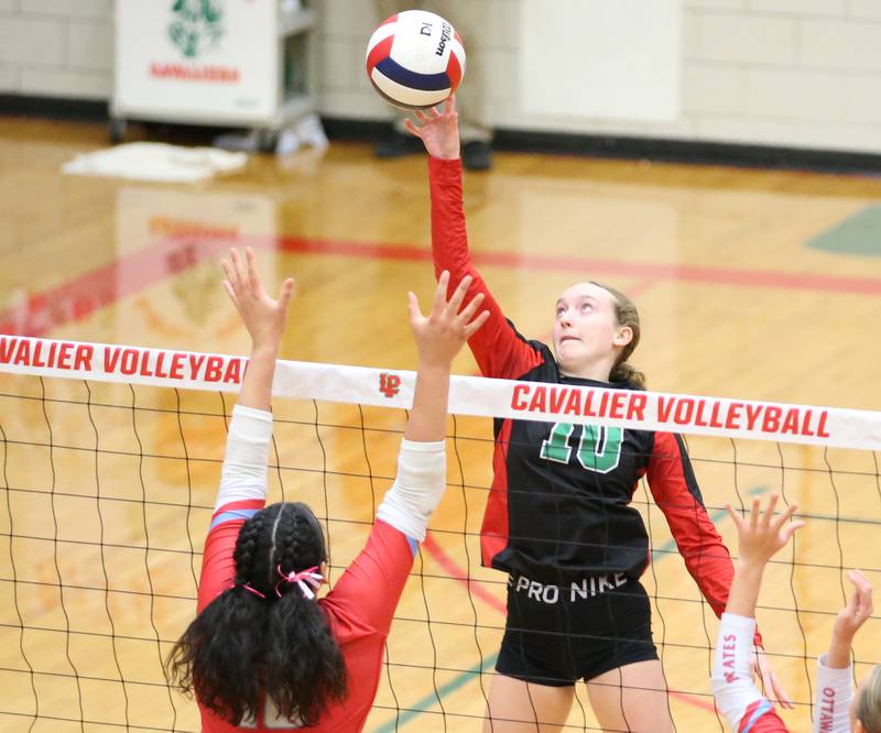 L-P's Katie Sowers hits the ball past Ottawa's Chey Joachim on Tuesday, Oct. 17, 2023 at Sellett Gymnasium.