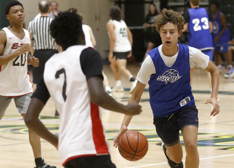 Woodstock's Max Beard brings the ball up the court during a game against Rockford East Friday, June 23, 2023, in the Crystal Lake South Gary Collins Shootout, at the high school in Crystal Lake.