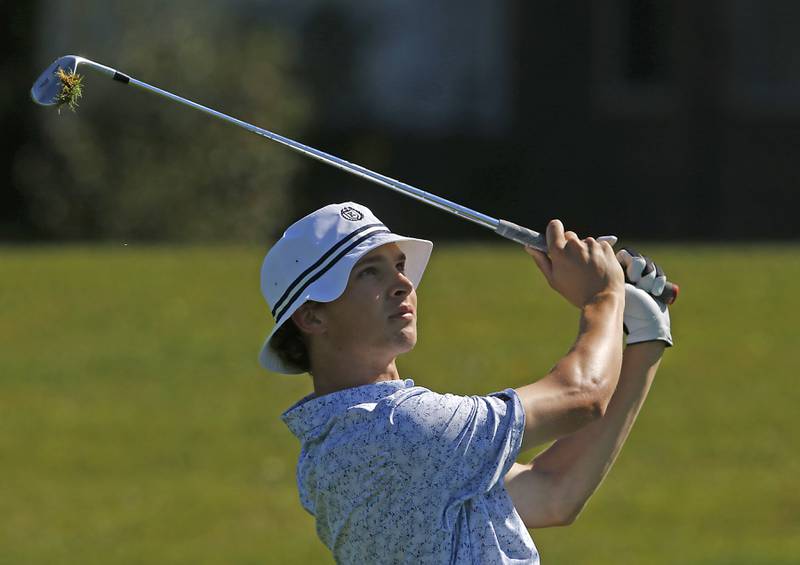 Burlington Central’s Camden Sarallo watches his fairway shot on the 10th hole during the Fox Valley Conference Boys Golf Tournament Wednesday, Sept. 25, 2024, at RedTail Golf Club in Lakewood.