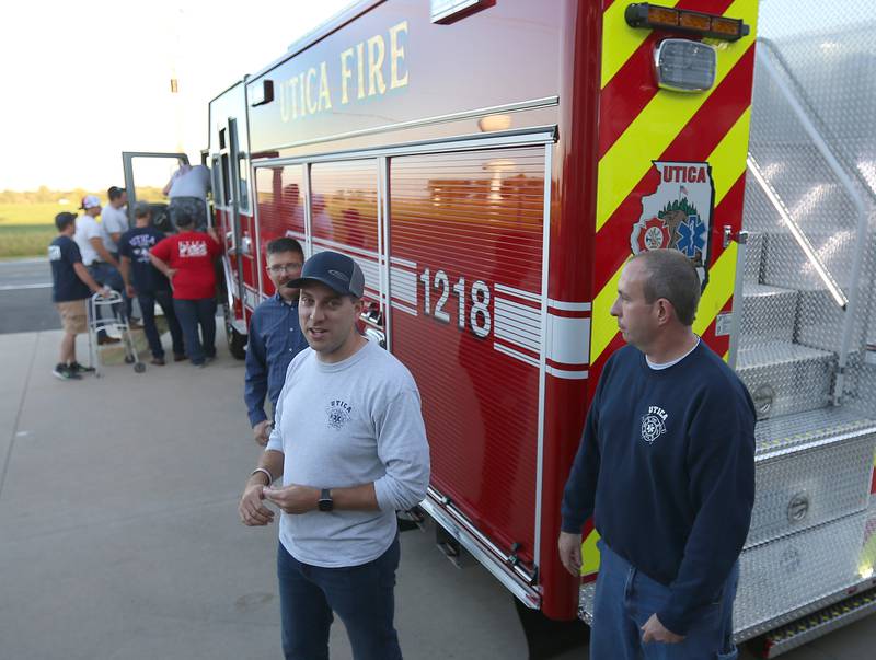 Utica Fire Chief Ben Brown (center) assistant chief Drew Partain (left) and lieutennant James Didricksen welcome the public to the push-in ceremony for a new Pierce Heavy Duty Rescue Truck at the Utica Fire Station on Thursday, Sept. 14, 2023. The $706,000.00 truck will replace a 28 year old rescue truck. The new vehicle will have equipment to handle water rescue, industrial accidents and grain bin emergencies. The department hopes to have it in operation on Columbus Day weekend.