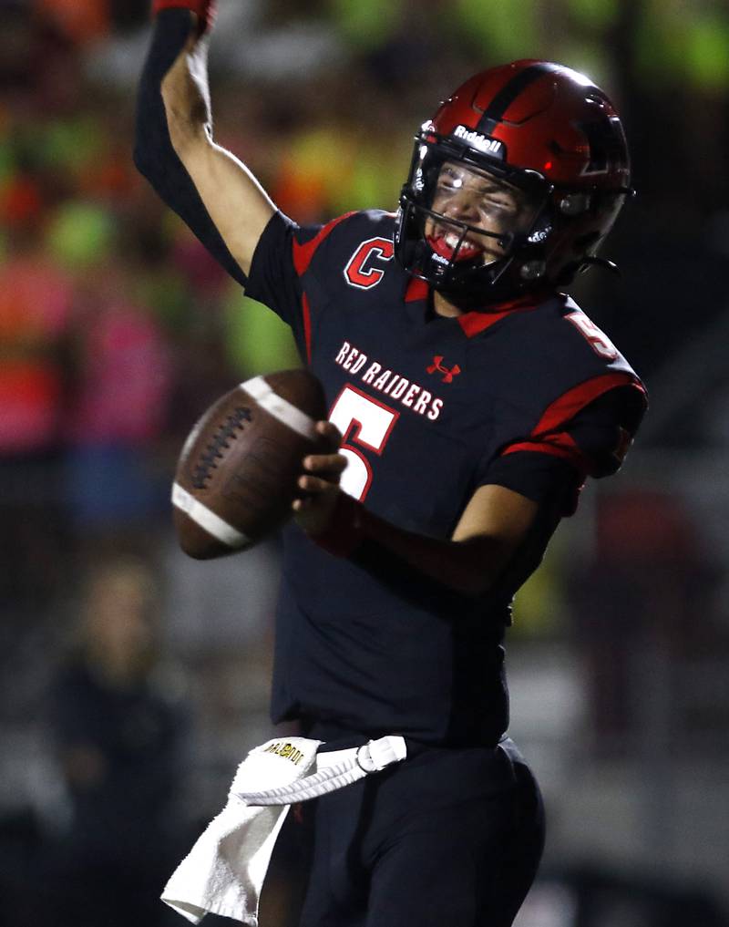 Huntley's Malik Carter celebrates a touchdown during a Fox Valley Conference football game Prairie Ridge on Friday, Oct. 3, 2025, at Huntley High School.
