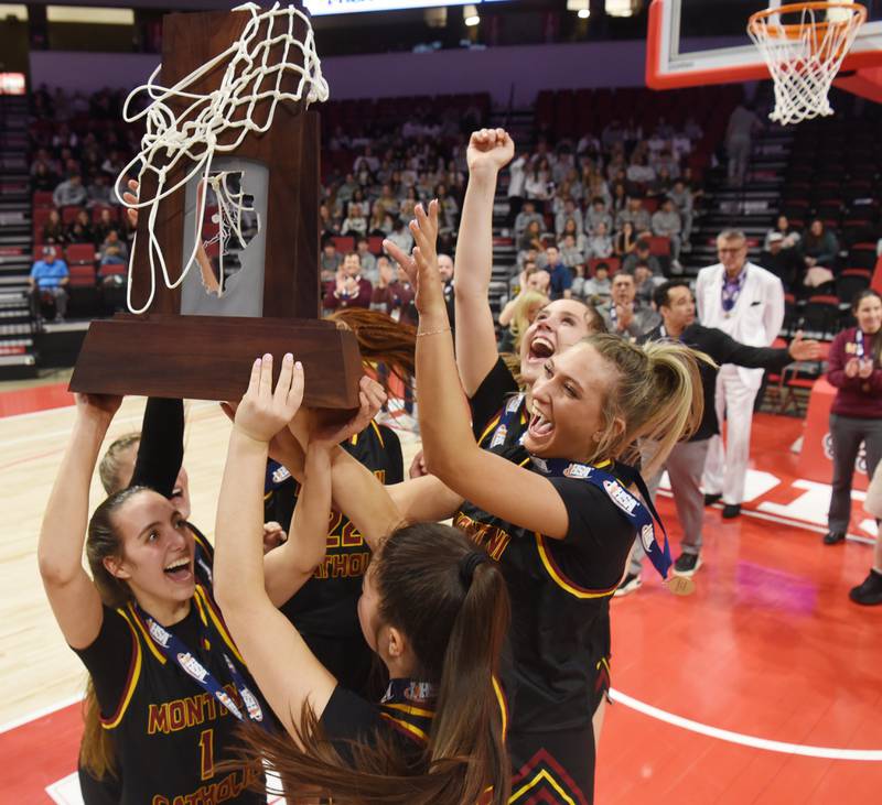 Montini players celebrate their 50-44 victory over St. Ignatius during the IHSA Class 3A girls state basketball championship game at CEFCU Arena on Saturday, March 8, 2025 in Normal.