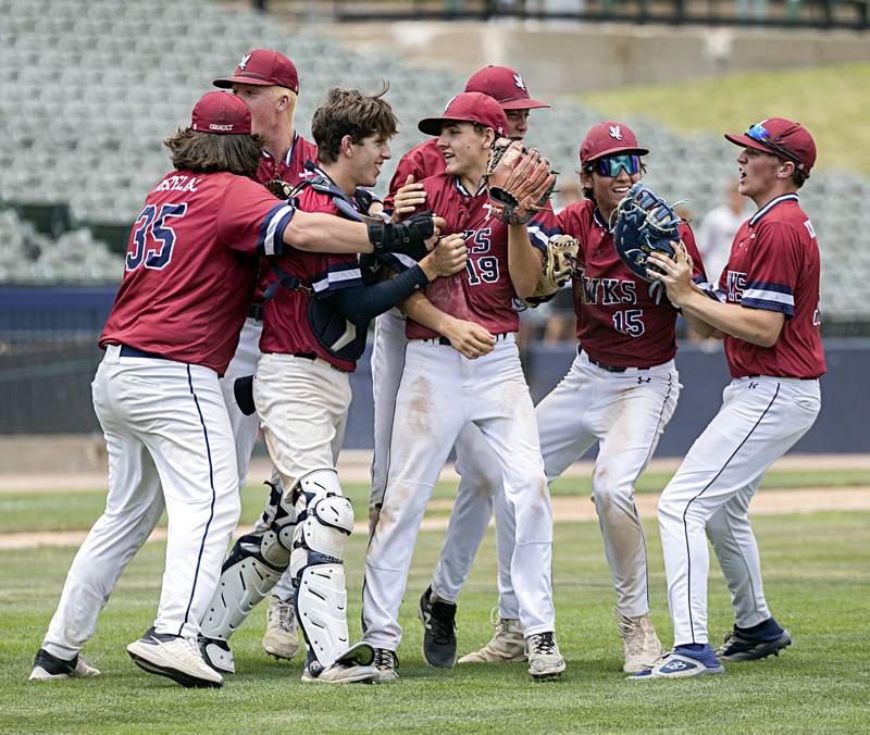 The Gibault Catholic Hawks celebrate their 8-0 win over Henry-Senachwine Saturday, June 3, 2023 to win the IHSA class 1A championship baseball game.