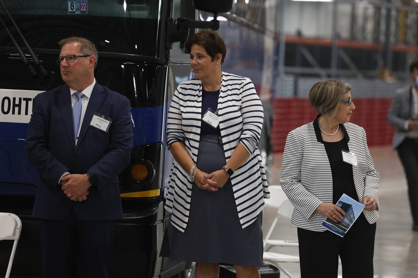 Will County Executive Jennifer Bertino-Tarrant, center, stands with Pace’s officials Rick Kwasneski and Melinda Metzger at Pace’s new 264,000 square foot state-of-the-art facility in Plainfield on Thursday. Thursday, July 21, 2022 in Plainfield.