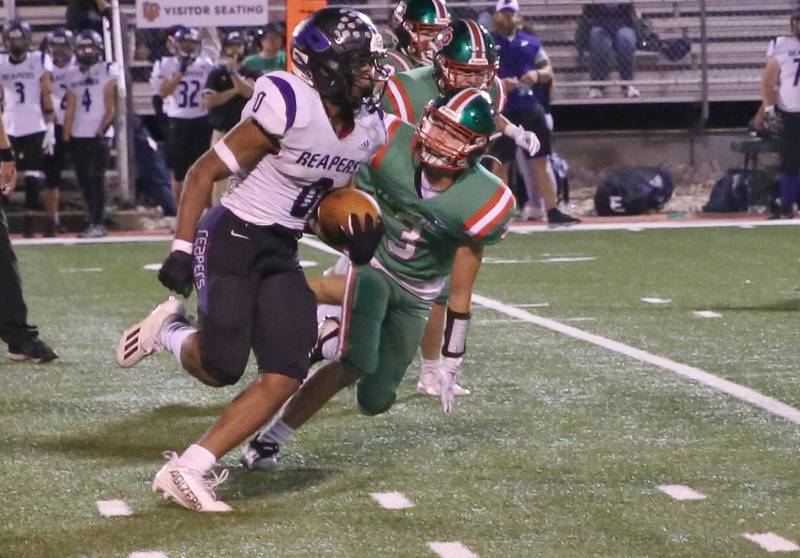 Plano's Andrew Cox sprints down the field past L-P's Michael Hartman on Friday, Sept. 15, 2023 at Howard Fellows Stadium.