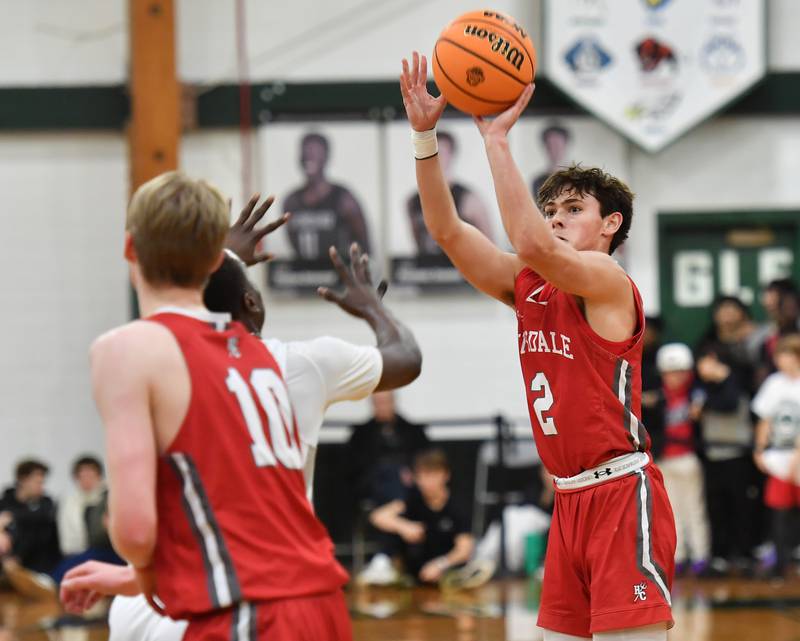 Hinsdale Central’s Dillon Orozco (2) shoots from three point range during a game against Glenbard West on January 31, 2025 at Glenbard West High School in Glen Ellyn.