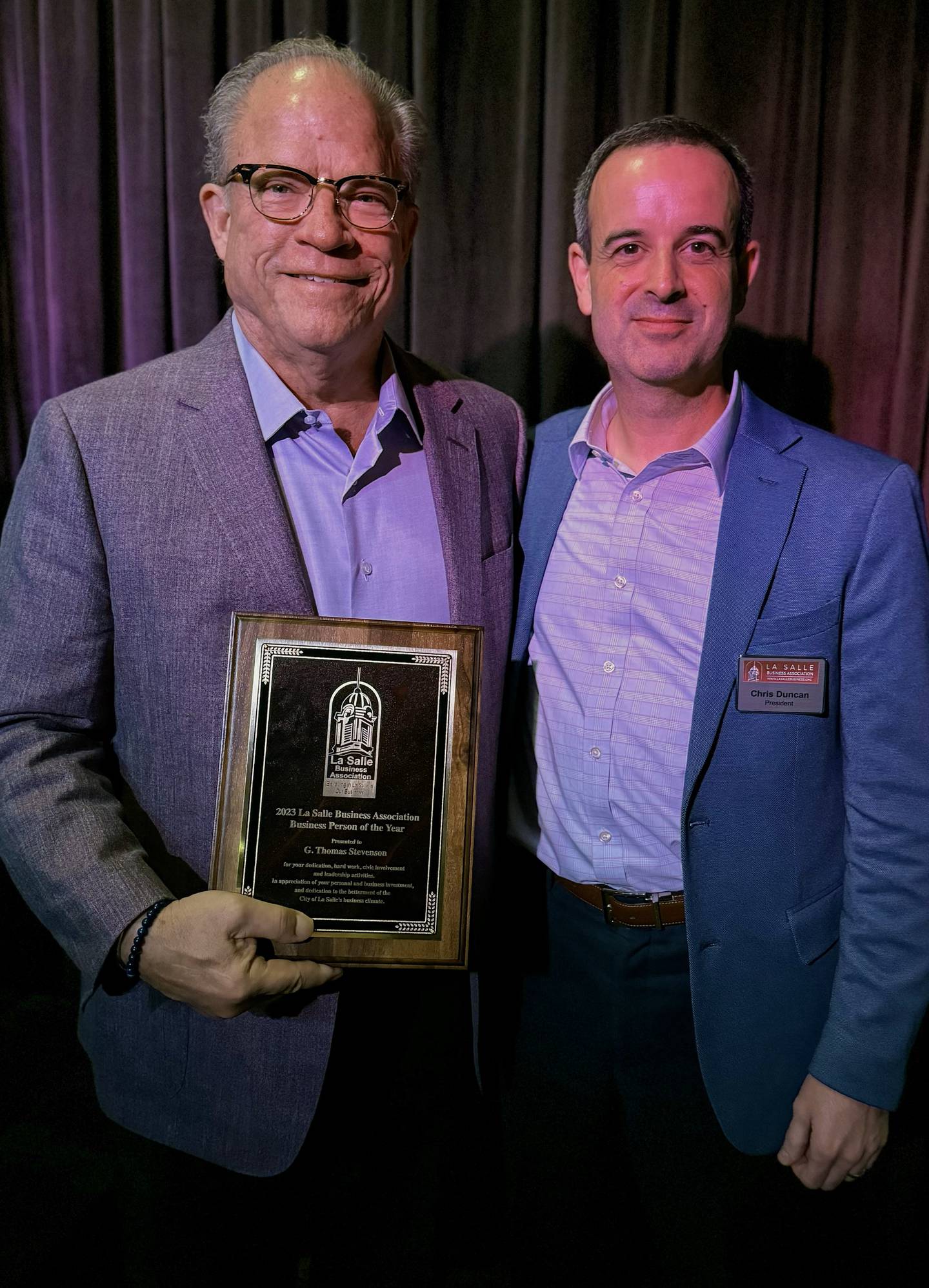(From left) Tom Stevenson of Geneva Holdings Inc. is photographed with La Salle Business Association President Chris Duncan after receiving the 2023 Business Person of the Year Award at the annual awards banquet Thursday, May 23, 2024.