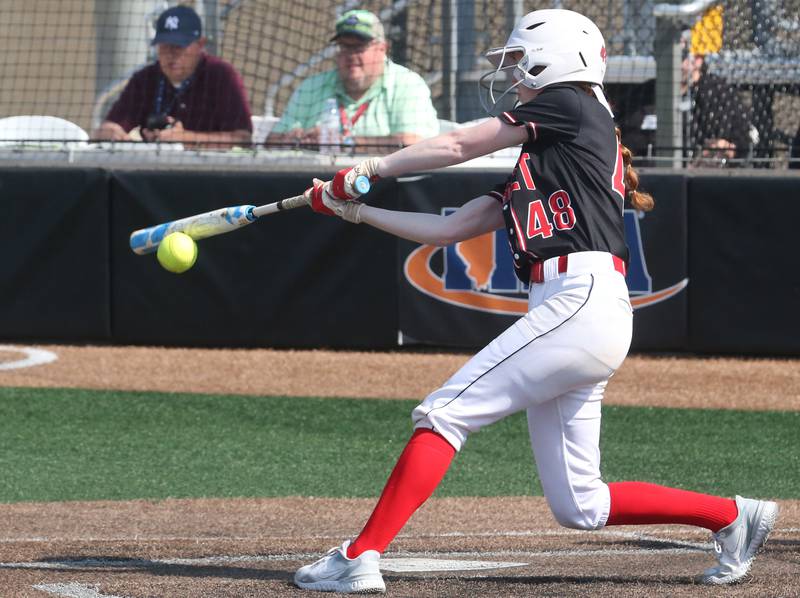 Benet Academy's Mirikate Ritterbusch hits a base hit against Charleston during the Class 3A State third place game on Saturday, June 10, 2023 at the Louisville Slugger Sports Complex in Peoria.
