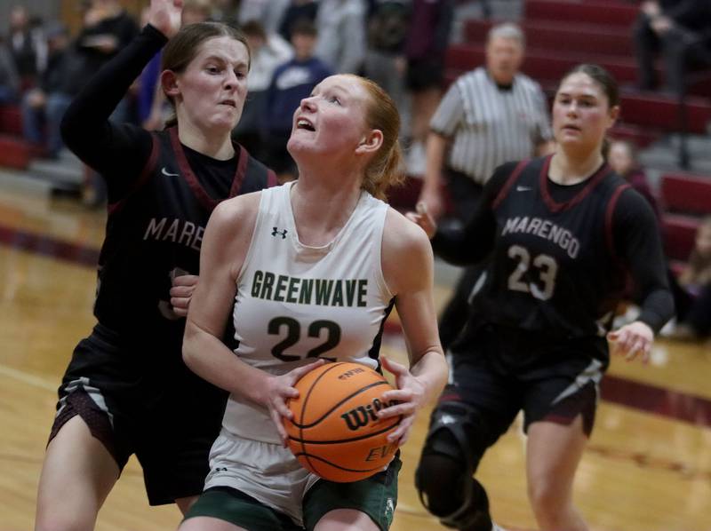 Marengo’s Maggie Hanson, left, guards St. Edwards’ Layne Dawson in IHSA Regional Championship girls basketball on Thursday, Feb. 19, 2026, at Marengo High School in Marengo.