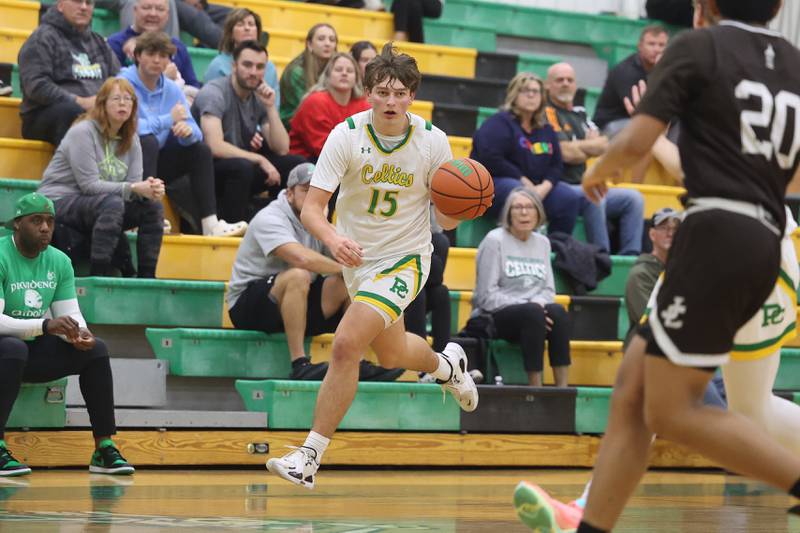 Providence’s Bob Jenner looks for a play against Joliet Catholic on Saturday, Dec. 9th, 2023 in New Lenox.
