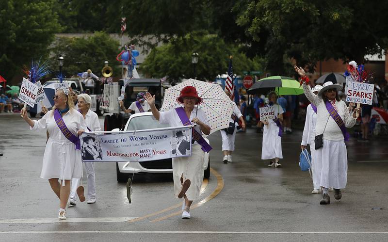 Members of the League of Women Voters march during the Lake Bluff Fourth of July parade on Friday, July 4, 2025, in Lake Bluff.