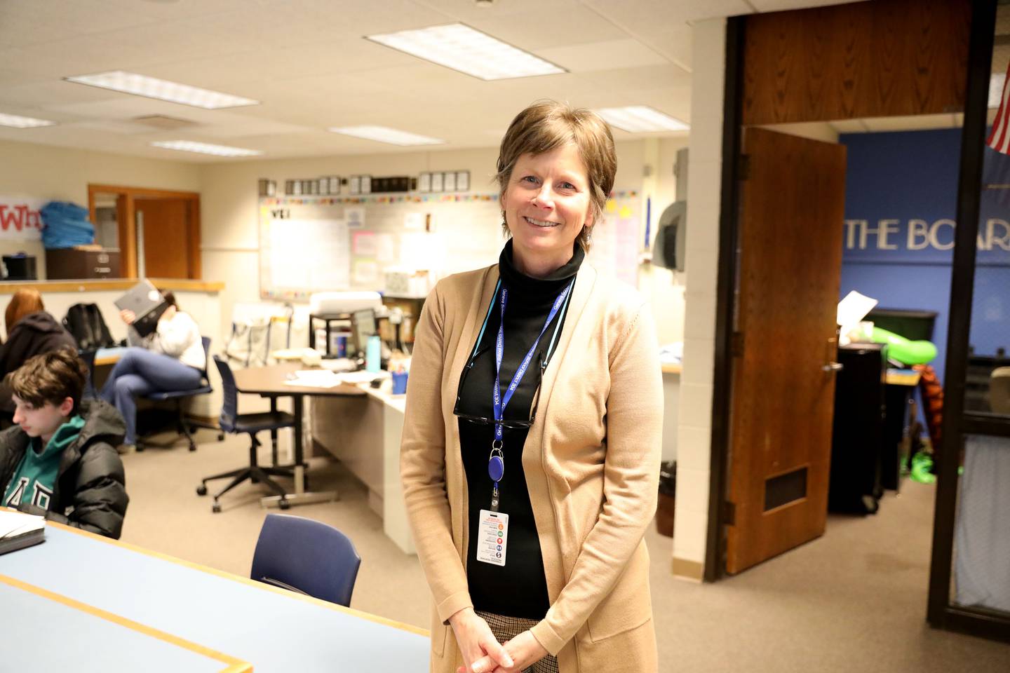 Jamie Dunlap teaches a business class at Geneva High School. Dunlap became a teacher after a becoming a certified public accountant and running several of her own businesses.