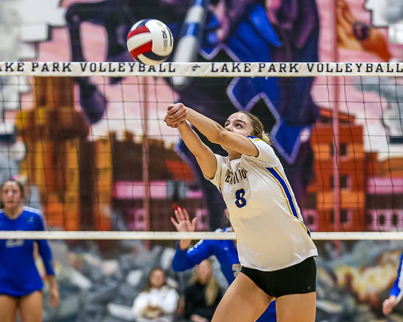 Wheaton North's Aurora Zingales (8) bumps the ball during Class 4A Lake Park Regional final volleyball match between Wheaton North at St Charles North.  Oct 31, 2024  in Roselle.