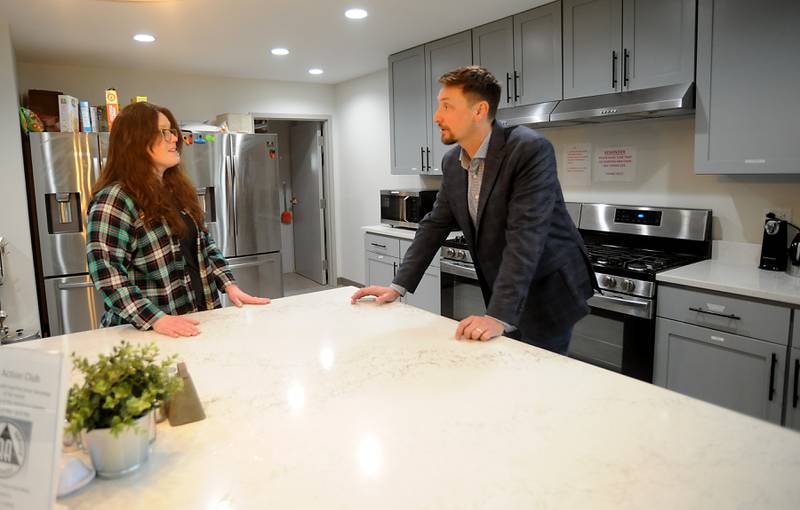 New Directions Addiction Recovery Executive Director Bobby Gattone, right, and office manager Jessica Darnell talk inside the New Directions facility at 14411 Kishwaukee Valley Road in Woodstock. The nonprofit received almost $1 million in a grant from the county to open a new facility to further its addiction recovery efforts.