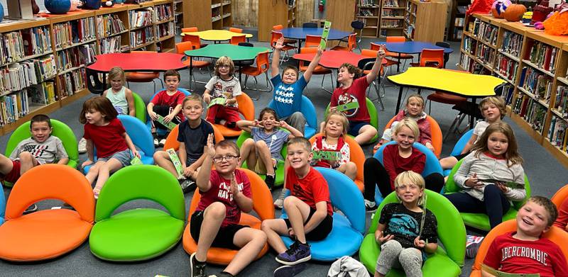 Prairie View Elementary School students enjoy new chairs in the library thanks to a grant from the Rotary Club of Sandwich.