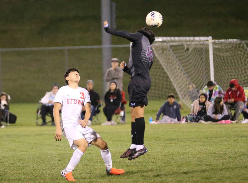 Kankakee's Luisangel Pereda beats out Ottawa's Manuel Saucedo-Garcia to a header during the Class 2A Regional semifinal game on Monday, Oct. 20, 2025 at Ottawa High School.