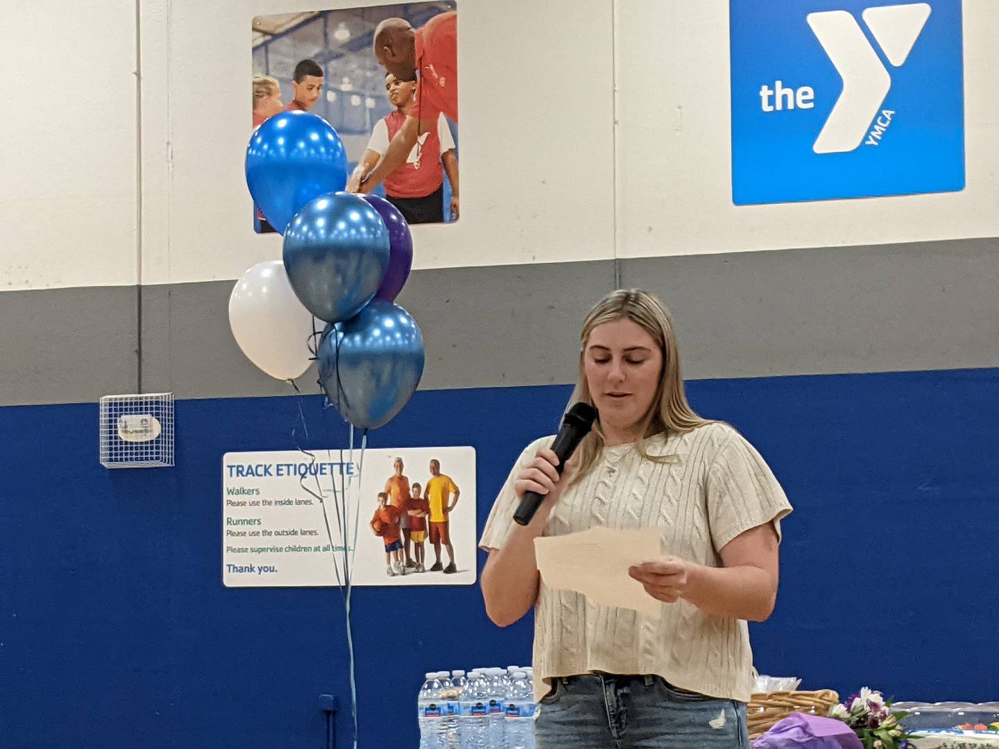 Lauren Betzwiser, the granddaughter of Judy and the late Clyde Avery, spoke during a celebratory ribbon cutting ceremony marking the 20th anniversary 
of the C.W. Avery Family YMCA in Plainfield on Wednesday, Feb. 4, 2026.