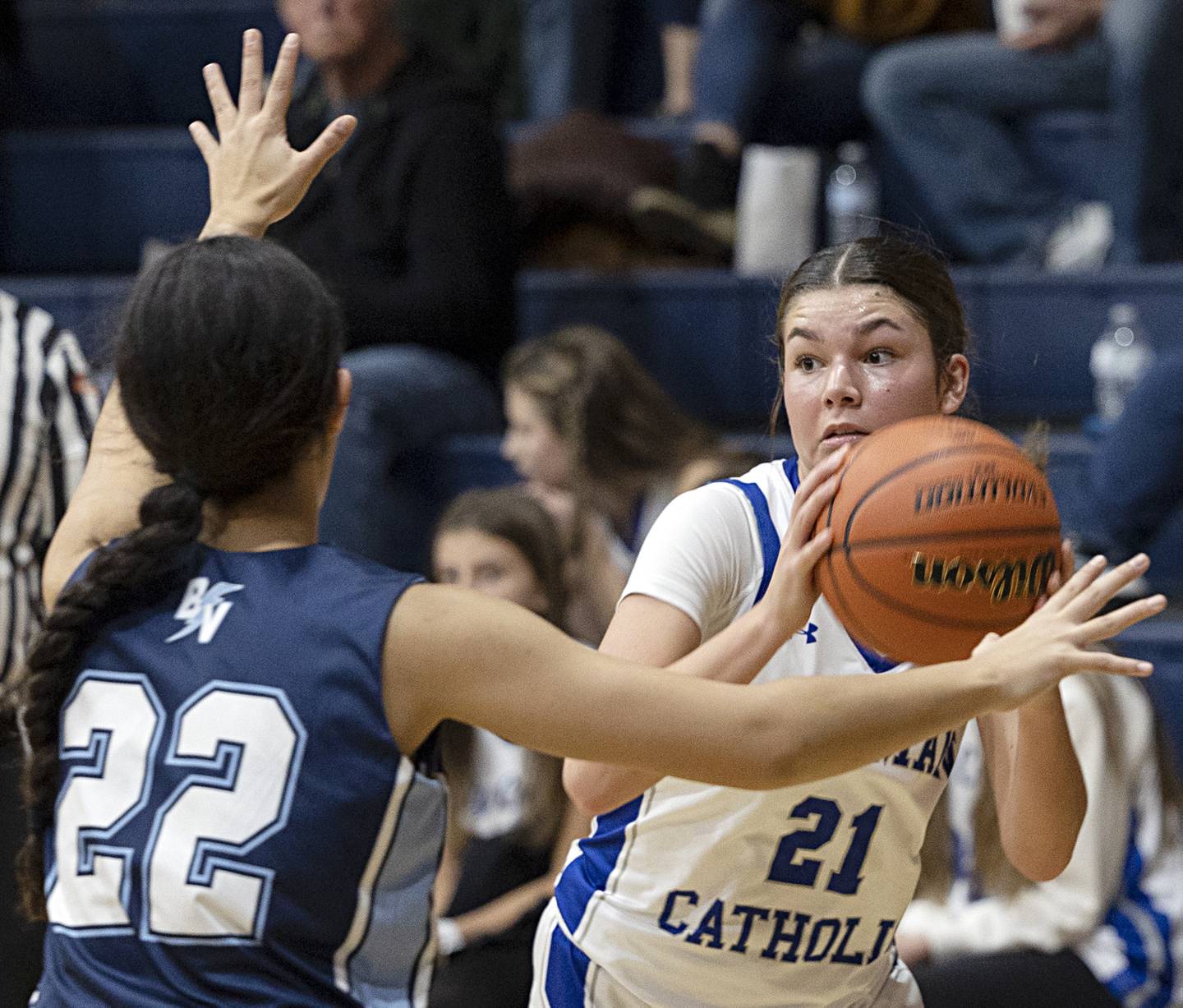 Newman’s Madison Duhon looks to pass against Bureau Valley’s Izabella Birkey Thursday, Nov. 30, 2023 in Sterling.