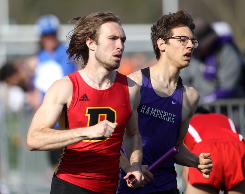 Batavia’s Jonah Fallon passes Hamphshire’s Mitchell Dalby during the 4x800-meter relay during the Kane County Boys Track and Field Invitational at Geneva High School on Monday, May 9, 2022.