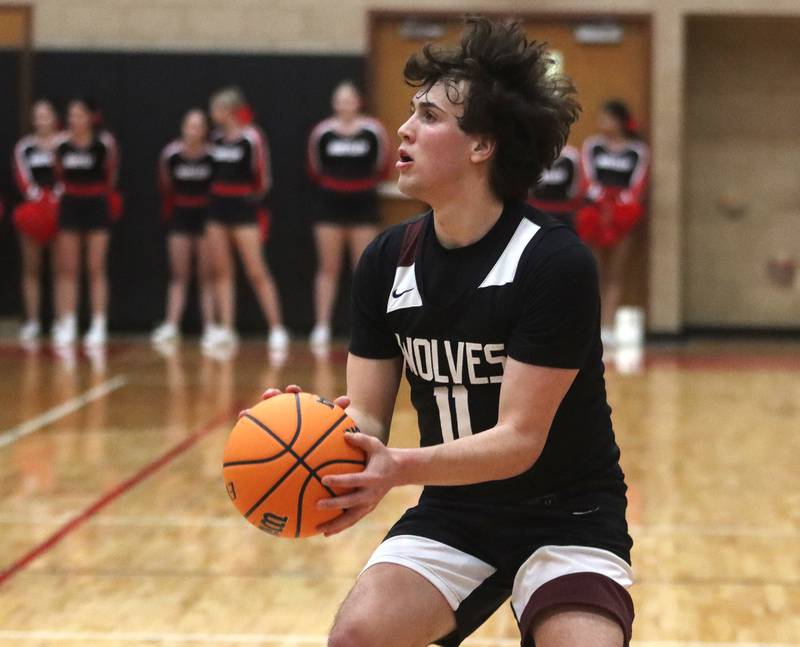 Prairie Ridge’s Ben Gablenz sets for a three pointer in varsity boys basketball on Tuesday, Feb. 18, 2025, at  Huntley High School in Huntley.