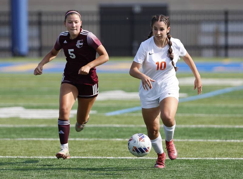 Crystal Lake Central's Addison Schaffer (10) handles the ball during first half action in the 2A girl's varsity supersectional soccer match between Crystal Lake South and St. Ignatius high schools on Tuesday, June 3, 2025 in Chicago.