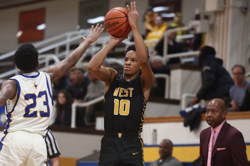 Joliet West’s Zion Gross puts ups the outside shot against Joliet Central on Saturday, Jan. 27th, 2024 in Joliet.