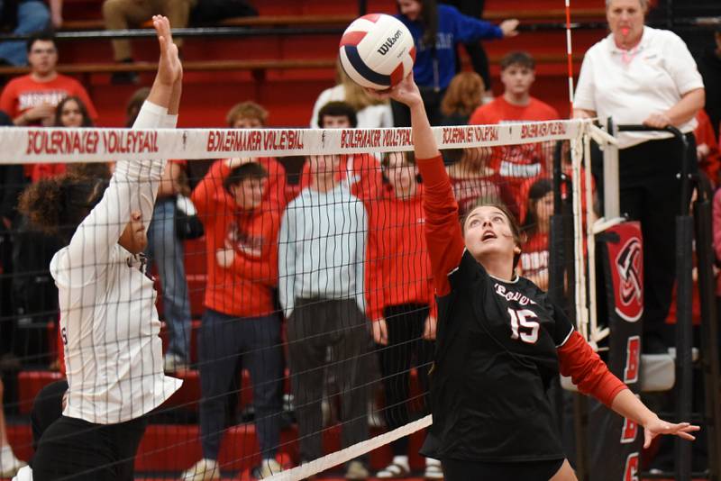 Bradley-Bourbonnais' Paige Curtis, right, meets Champaign Central's Iy'Jah Grant at the net during a game at Bradley-Bourbonnais Thursday, Oct. 23, 2025.