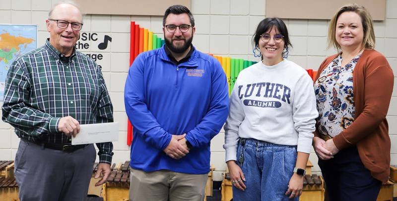 DeKalb County Community Foundation representatives Charlie McCormick and Jolene Willis presenting a check to Farny R. Wurlitzer Foundation Fund Grant recipients Brian Drews and Kaitlyn Andrews