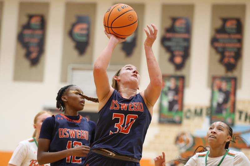 Oswego’s Peyton Johnson puts up a shot against Plainfield East on Tuesday, Jan. 13, 2026 in Plainfield.
