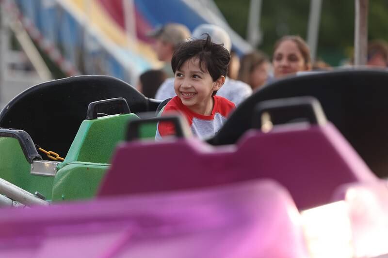 Franco Del Toro enjoys one of the rides at Old Canal Days on Friday June 7, 2024 in Lockport.