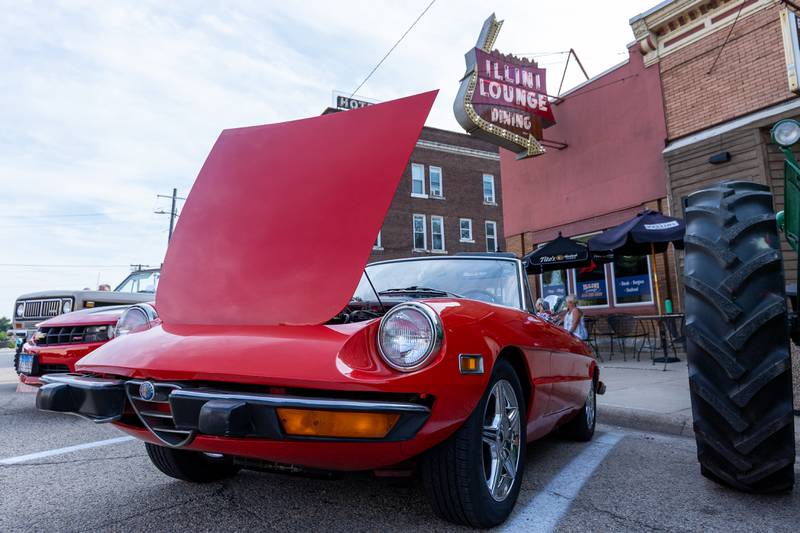 The car sits with its hood up at the 20th annual Cruise Night on Friday, August 8, 2025, on Main Street in Marseilles