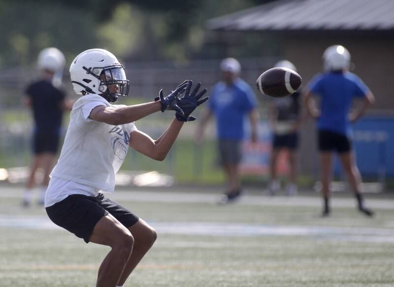 Geneva’s Talyn Taylor makes a catch during the first day of practice for the fall season on Monday, Aug. 7, 2023 at the school.