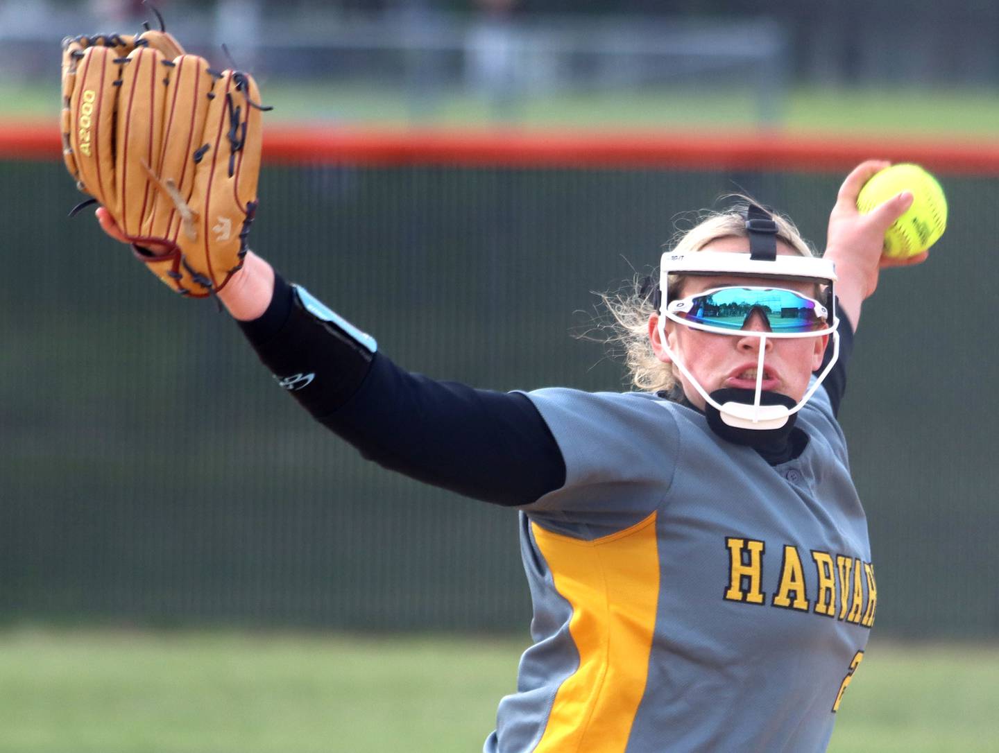 Harvard’s Kara Knop delivers in varsity softball at Crystal Lake Central High School in Crystal Lake on Monday, May 19, 2025.