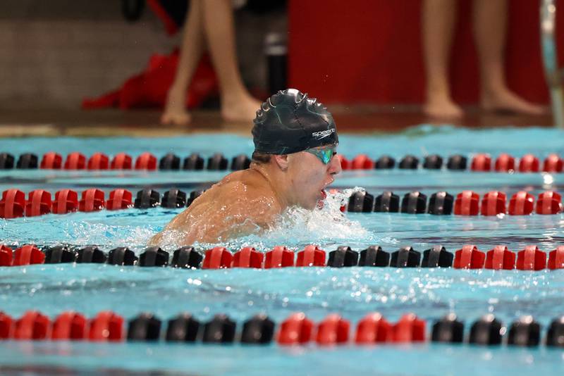 Bishop McNamara's Rocco Haigh competes in the 100-yard breaststroke during the All-City meet on Tuesday, Jan. 6, 2026.