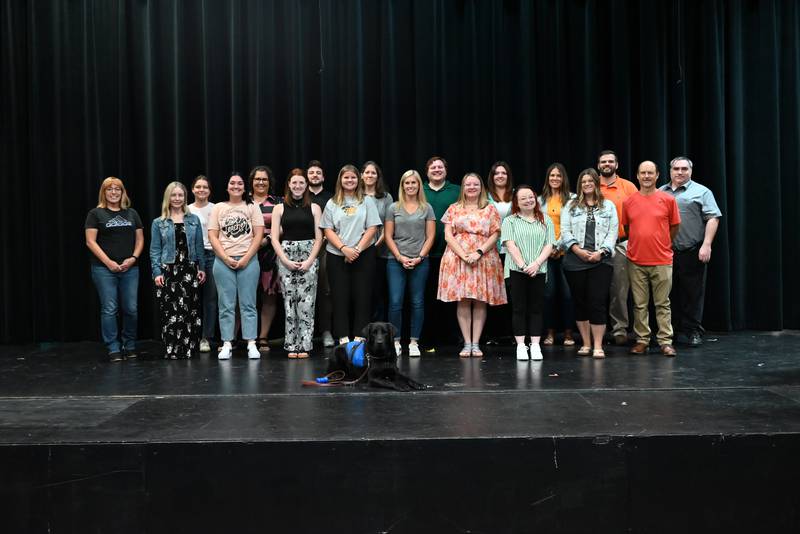 Front: Rugby (Therapy Dog)

First Row (left to right): Samantha Morse (PCJH Social Worker), Gianna Baracani (PreK Special Education Teacher), Katrien Holocker (PCPS Paraprofessional), Courtney Kobold (PCHS Social Worker), Megan Kindred (PCJH Math Teacher), Marlea Smaga (PCHS Math Teacher), Cheyanne Sunken (PCHS Paraprofessional), Anna Kirbach (PCPS 1st-Grade Teacher), Doug Colmone (PCHS Paraprofessional)

Back Row (left to right): Erin Duffy (PCES PE Teacher), Kayleigh Parham (PCPS/PCES Paraprofessional), Kelly Sartin (PCPS Paraprofessional), Wesley Allison (PCHS Paraprofessional), Kim Gorges (PCPS Cook), Kevin Alleman (PCPS/PCES Music Teacher), Kayla Harris (PCHS Agriculture Teacher), Mandi Ponsetti (PCPS Paraprofessional), Blake McManus (PCHS Agriculture Teacher), Jeff Rundle (Director of Technology)