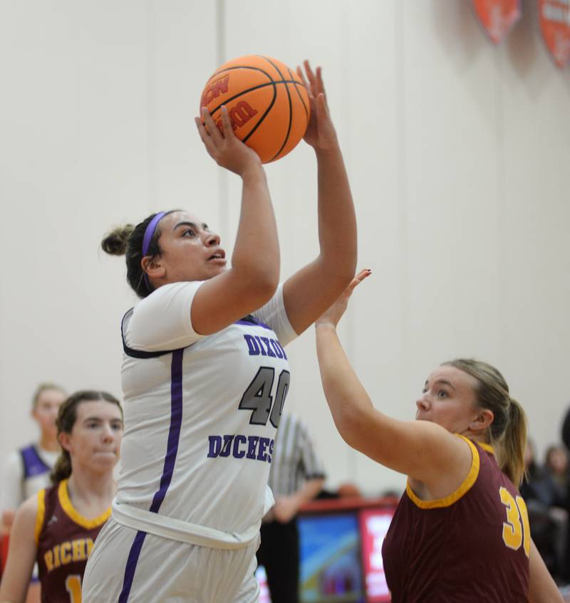Dixon's Hallie Williamson (40) shoots against Richmond Burton at the Oregon Girls Basketball Tip-Off Tournament on Wednesday, Nov. 20, 2024 at the Blackhawk Center in Oregon.