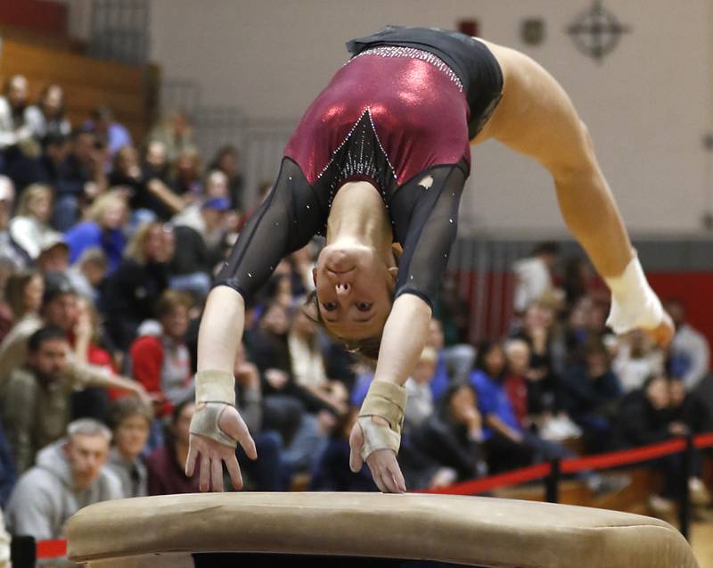 Prairie Ridge’s Nora Terhaar competes on the vault during the IHSA Mundelein Gymnastics Sectional on Feb. 13, 2025, at Mundelein High School.