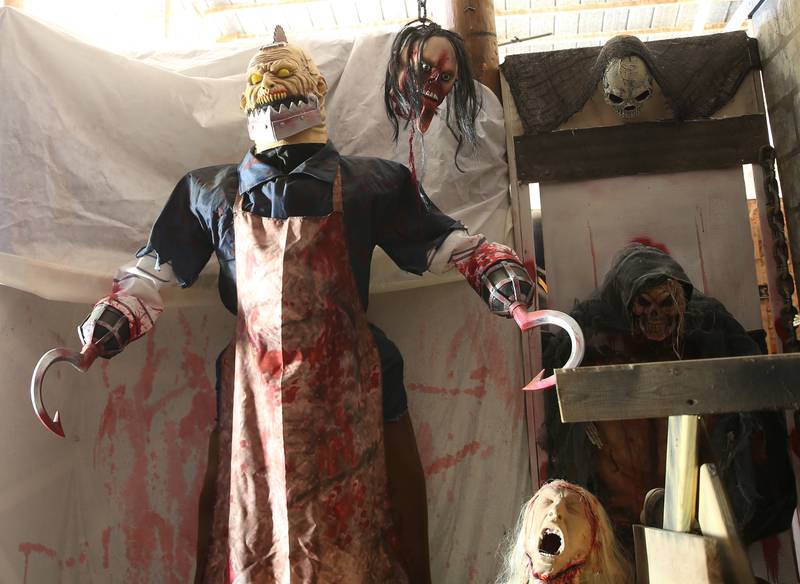 A haunted figure moves around a room during the Nightmare on Fairgrounds Road Haunted Attraction on Wednesday, Sept. 25, 2024 at the Bureau County Fairgrounds in Princeton.