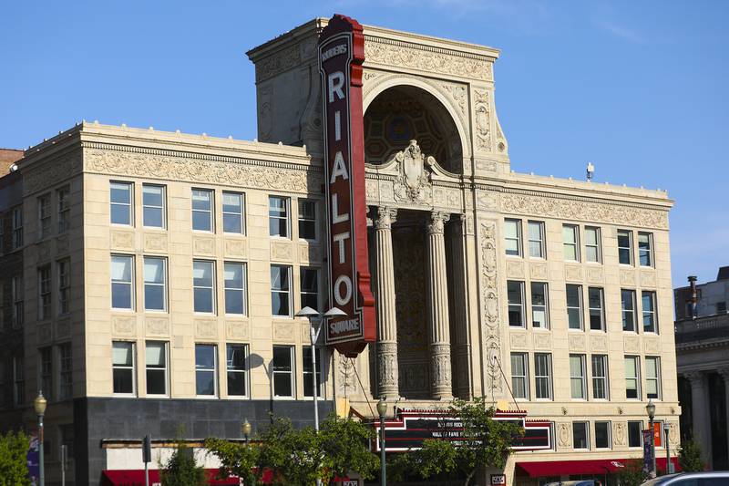 The sun sets over the Rialto Square Theatre on Tuesday, Aug. 31, 2021, in Joliet, Ill.