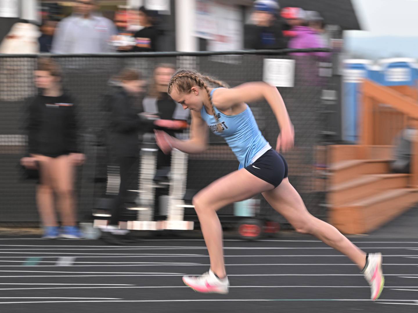 Prospect’s Meg Peterson starts the 400-meter dash at the Wheaton Warrenville South Tiger Invitational girls track and field meet in Wheaton on Friday, April 26, 2024.