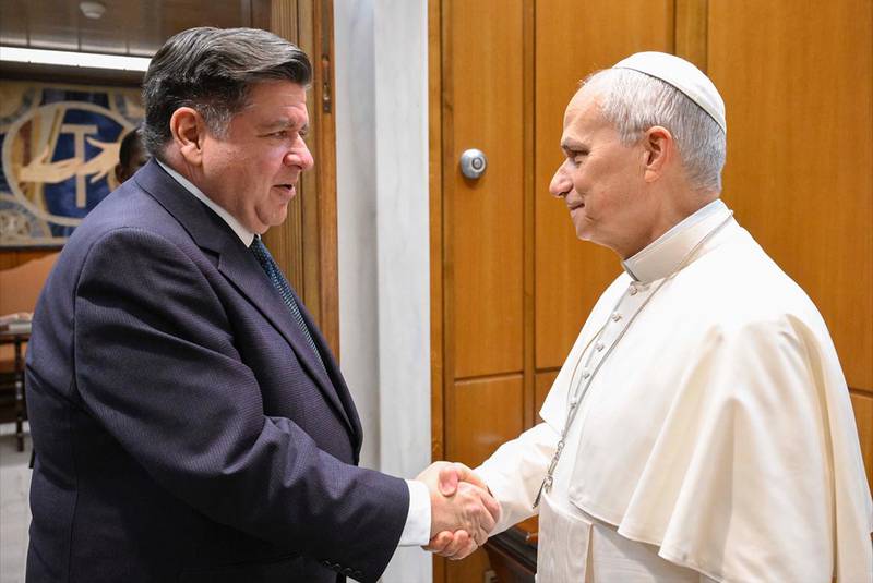 Illinois Gov. JB Pritzker shakes Pope Leo XIV’s during a meeting in Vatican City on Wednesday, Nov. 19, 2025.