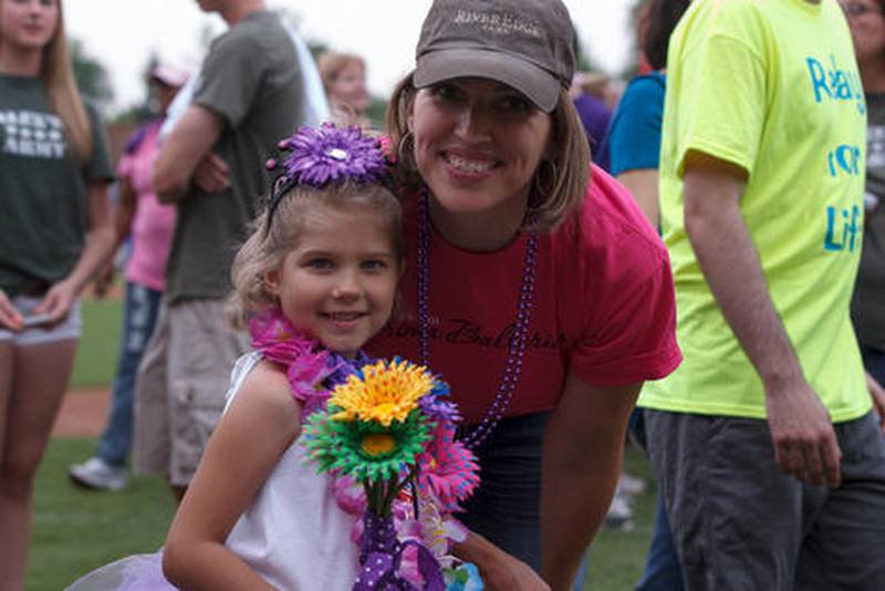 Co-honoree and cancer survivor Carinne Forpanek, 6, and her mother, Cassandra Forpanek, at the 2013 Relay For Life event Friday at Fifth Third Bank Ballpark in Geneva.